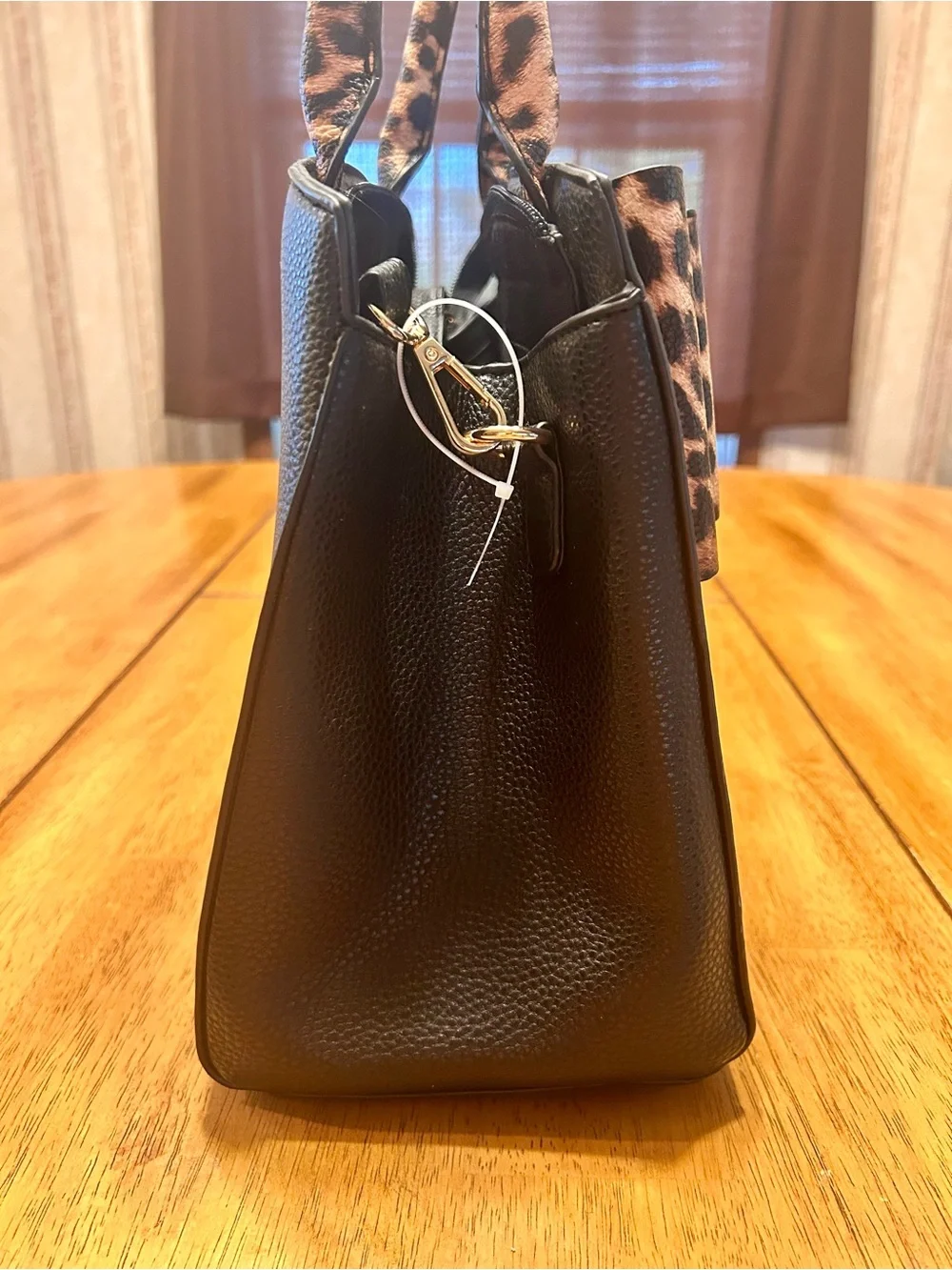 Crossi Chic Black Satchel with Leopard Bow Accent